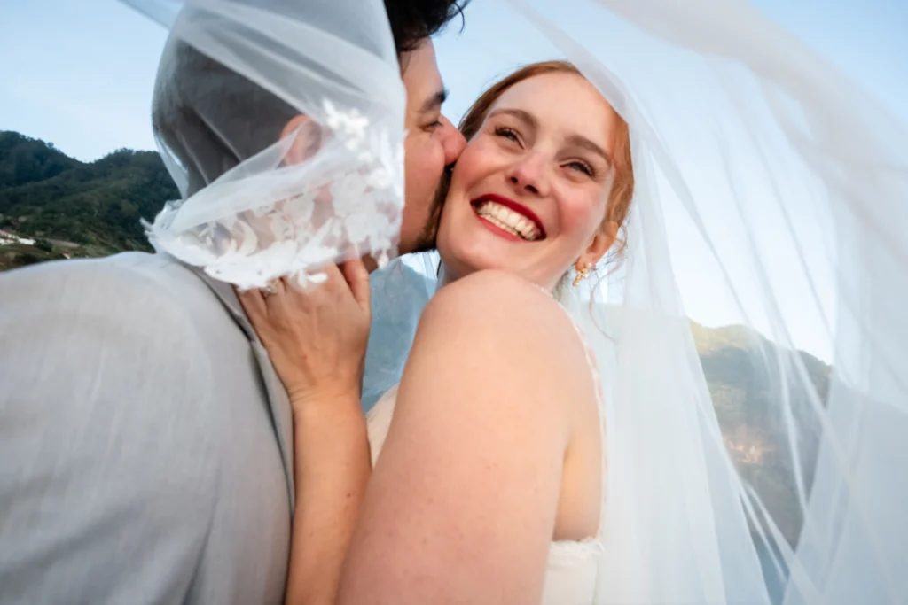Bride and groom smiling